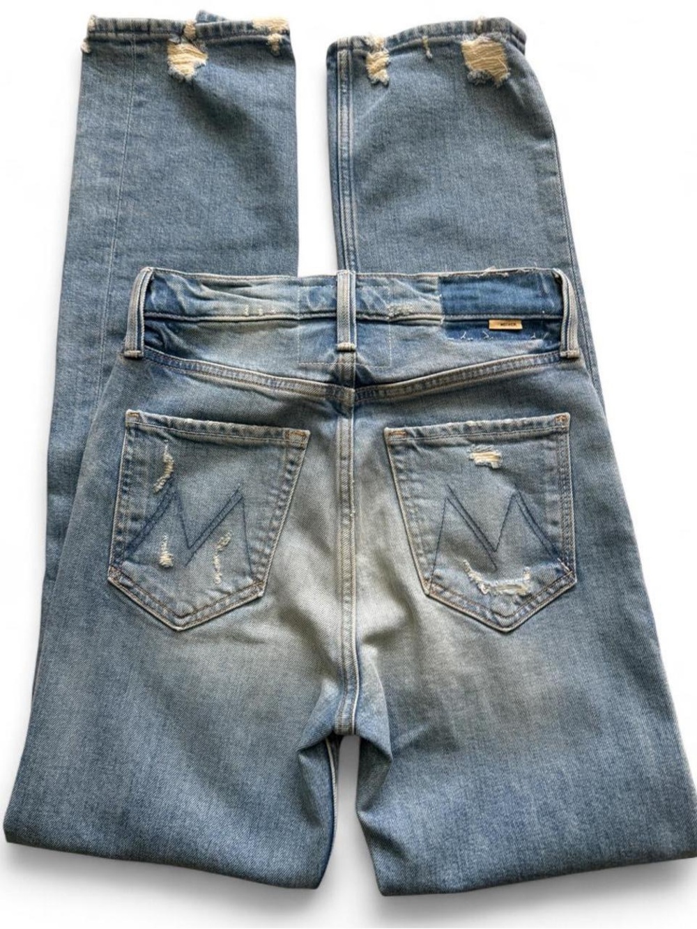 Mother Superior Jeans
Blue denim with distressed details